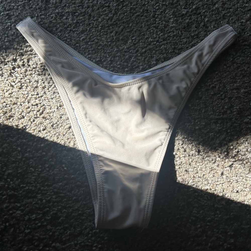Tan cheeky bikini bottoms